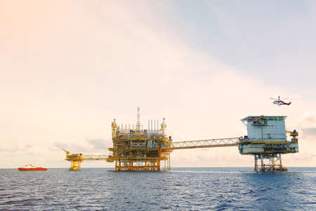 Offshore construction platform for production oil and gas. Oil and gas industry and hard work. Production platform and operation process by manual and auto function from control room.の写真素材