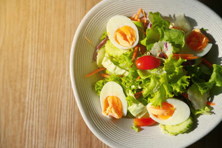 Fresh salad with fruit in breakfast for clean and healthy food. Salad in top view and empty area for text.の写真素材