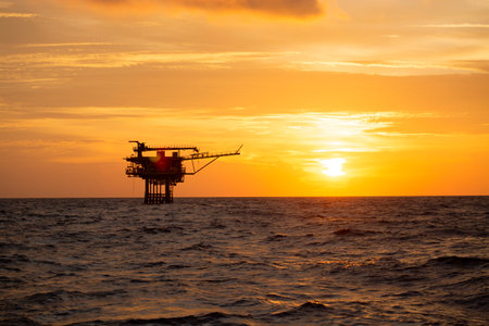 Offshore construction platform for production oil and gas. Oil and gas industry and hard work. Production platform and operation process by manual and auto functionの写真素材