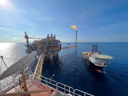 Offshore construction platform for production oil and gas. Oil and gas industry and hard work. Production platform and operation process by manual and auto function from control roの写真素材