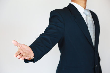 Businessman with suit and concept fight the business. Trader concept and action to fight with the business. Industry concept with businessman and acting for support presentation fiの写真素材