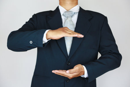 Businessman with suit and concept fight the business. Trader concept and action to fight with the business. Industry concept with businessman and acting for support presentation fiの写真素材