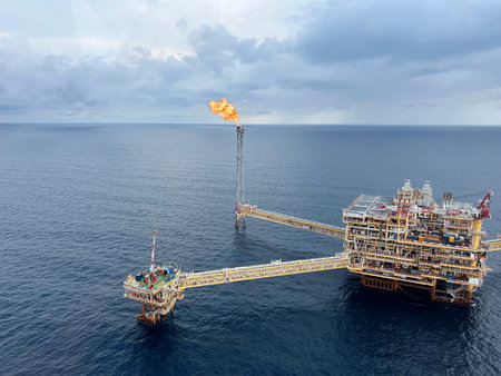 Offshore construction platform for production oil and gas. Oil and gas industry and hard work. Production platform and operation process by manual and auto function from control roの写真素材