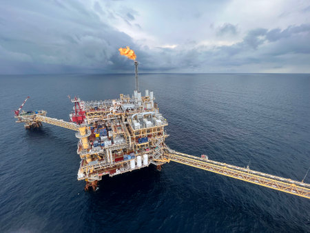 Offshore construction platform for production oil and gas. Oil and gas industry and hard work. Production platform and operation process by manual and auto functionの写真素材