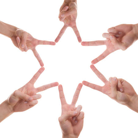 a star made out of fingers from different people with the sky as backgroundの写真素材