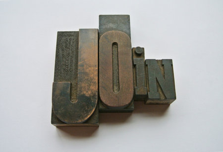 Join word composed with wooden typography
