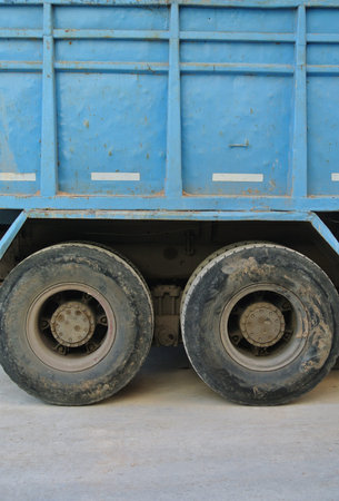Dirty construction truck wheels detail