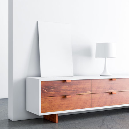 Blank poster canvas Mockup standing on bureau with the lampの写真素材