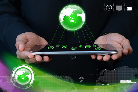 Businessman showing tablet with global networking