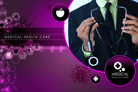 Young doctor showing stethoscopeの写真素材