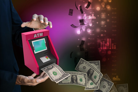 man hand showing  teller machineの写真素材