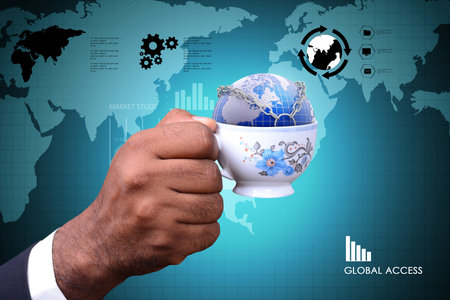 Man showing Concept of global business in tea cupの写真素材
