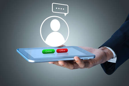 Business man with online buttonの写真素材