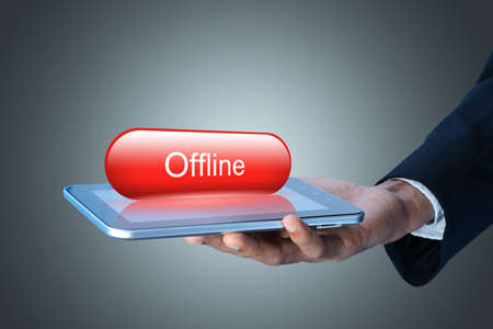 Man showing Tablet computer with offline conceptの写真素材