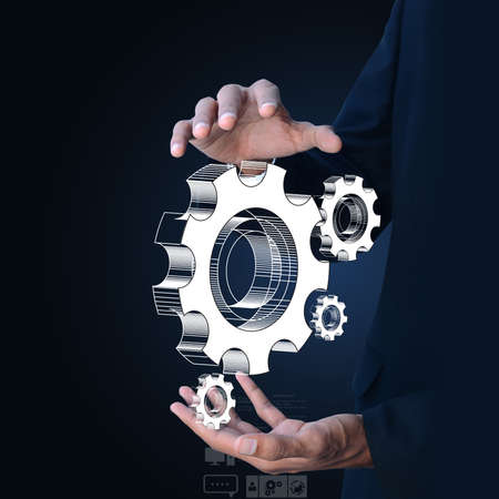 businessman showing gears cogs to success conceptの写真素材