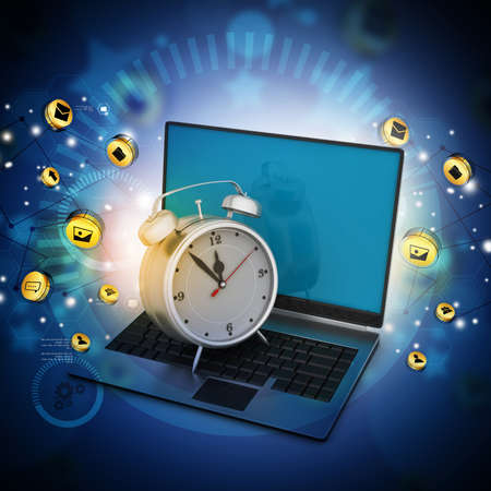 Laptop with alarm clockの写真素材