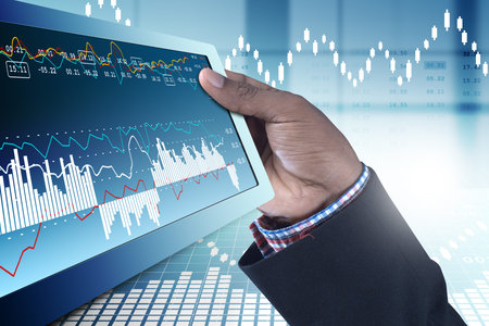 Business man showing the stock chart