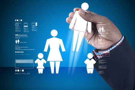 Family icon in the hands of manの写真素材