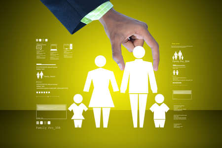 Family icon in the hands of manの写真素材