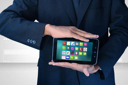 Man showing app icons in smart phone