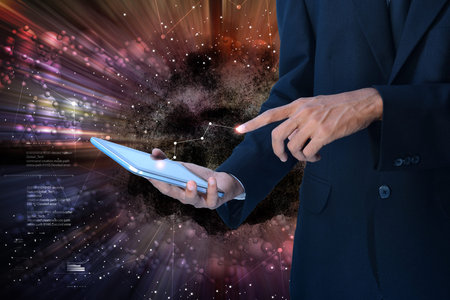 Business man working on tablet computer