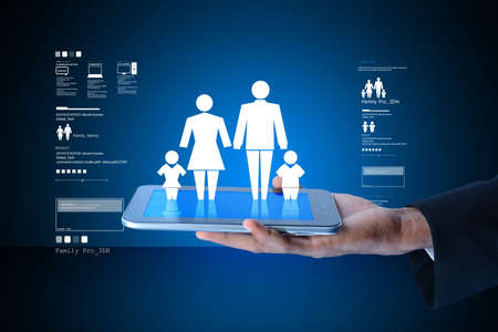 Family icon in the hands of manの写真素材