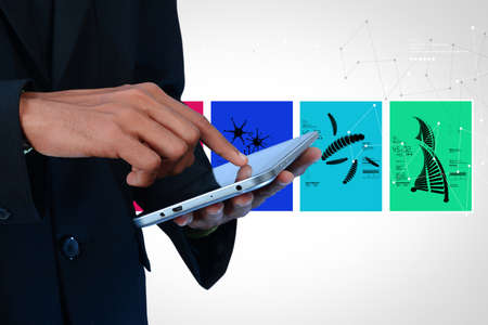 Man showing medical images in digital tabletの写真素材