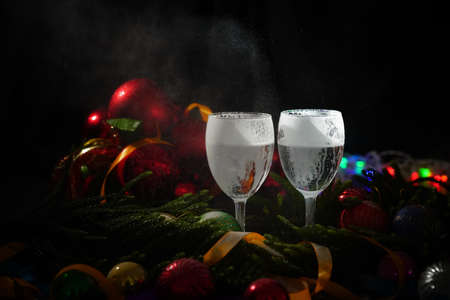 Glasses of champagne and new year decorationsの写真素材