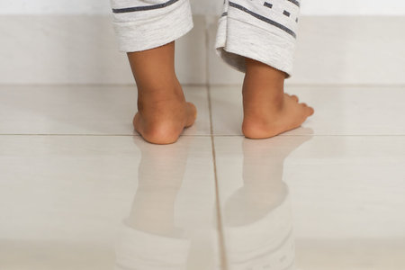 baby legs on the ceramic floor