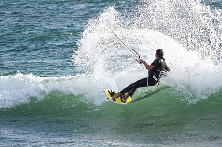 Kite surfer catching waves at Sunset Beach