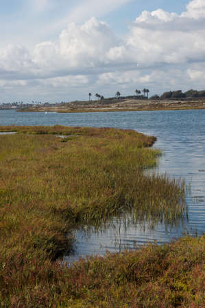 Scenic summer clouds over the Bolsa Chica Wetlands in Huntington Beach, Californiaの写真素材