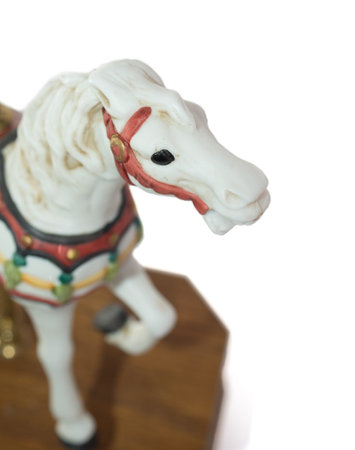 Minature Carousel Horse on white backgroundの写真素材