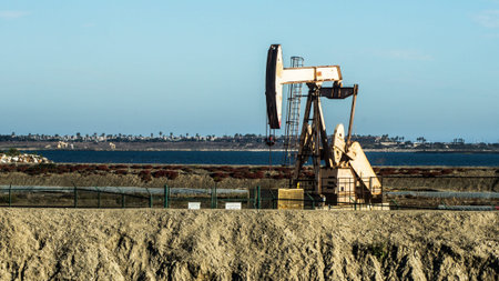 Pumpjack oil well located at the Bolsa Chica Wetlands nature reserve in Huntington Beach, California