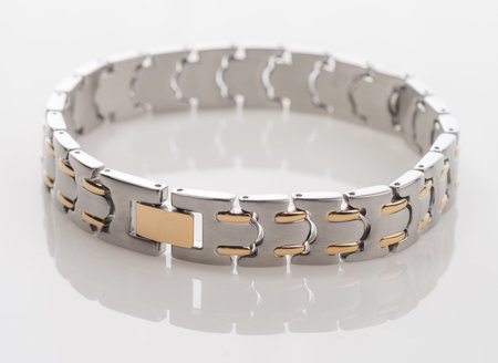 Men's stainless steel and gold braceletの写真素材