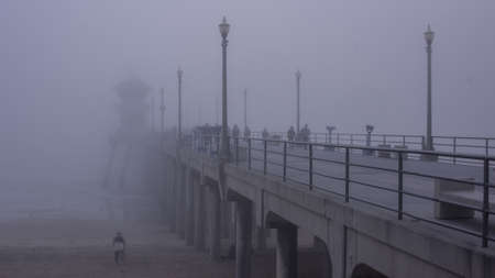 Fog covers The Huntington Beach Pierの写真素材