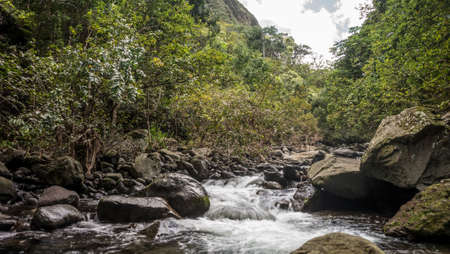 Long exposure captures slow flowing stream in the Iao Valley State Park on Mauiの写真素材