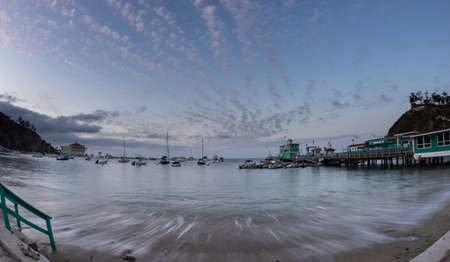 Catalina Island, California/USA May 2015.  Super wide angle view of Avalon Harbor with scenic view of bay, pier, boats, and historic Casino Buildingのeditorial素材