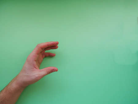 Young woman showing gesture on color background. Space for text. top viewの写真素材