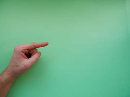 Young woman showing gesture on color background. Space for text. top viewの写真素材