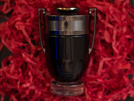 The iconic Paco Rabanne Invictus Intense fragrance bottle. Usa, March 2020. On background.のeditorial素材