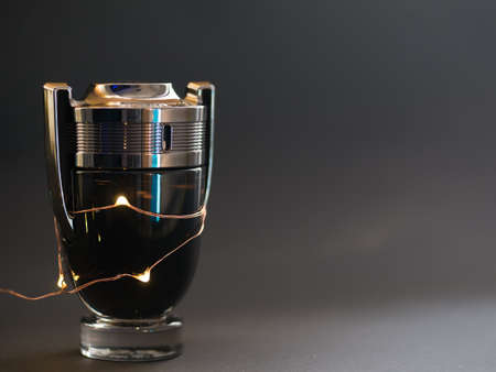 The iconic Paco Rabanne Invictus Intense fragrance bottle. Usa, March 2020. On background.のeditorial素材