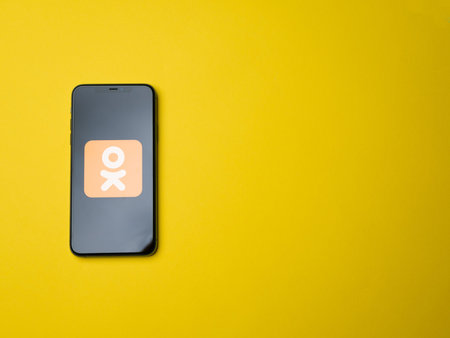 USA - May, 2020; Odnoklassniki Iphone Application Screen on colored paper background. #Odnoklassniki