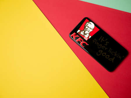 USA - May, 2020; KFC Iphone Screen on colored background. #KFCのeditorial素材