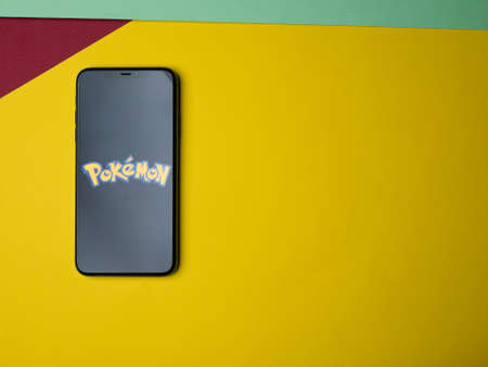 USA - May, 2020; Pokemon Iphone Application Screen on colored paper background. #Pokemon.のeditorial素材