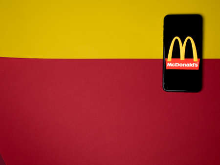 USA - May, 2020; McDonald Iphone Screen on colored background. McDonald's is an American fast food company. #McDonald'sのeditorial素材