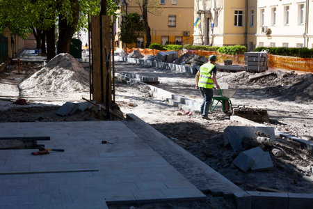 Road repairs, installation of a new sidewalk made of ancient cobblestones