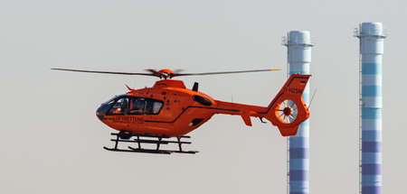 FRANKFURT, HESSEN, GERMANY-MARCH 9, 2014: rescue helicopter in actionのeditorial素材