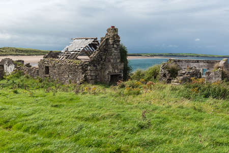 ruin of a house at the irish coastの写真素材