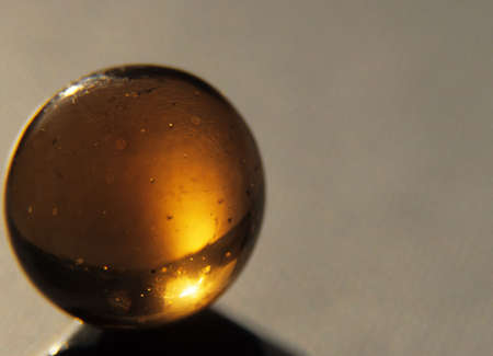 Golden Orb glass sphereの写真素材