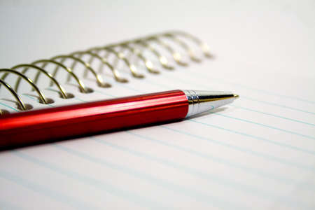 Pen on note paperの写真素材